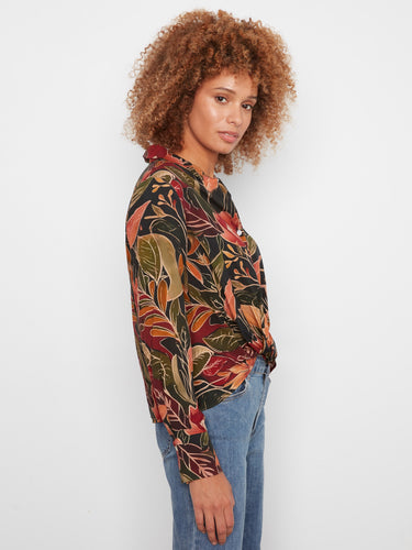 This button-front closure floral top combines functionality with fashion, making it an essential piece for versatile styling by Charlie B.