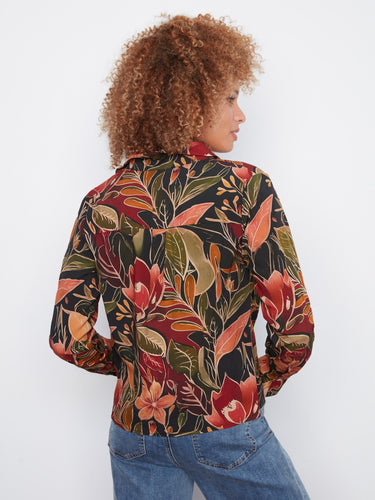 Long-sleeve floral blouse showcasing beautiful patterns, ideal for layering or wearing alone in any season by Charlie B.