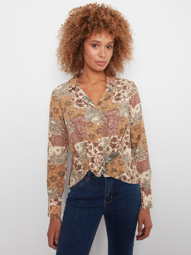 Long sleeves enhance the chic design of this patchwork shirt by Charlie B.