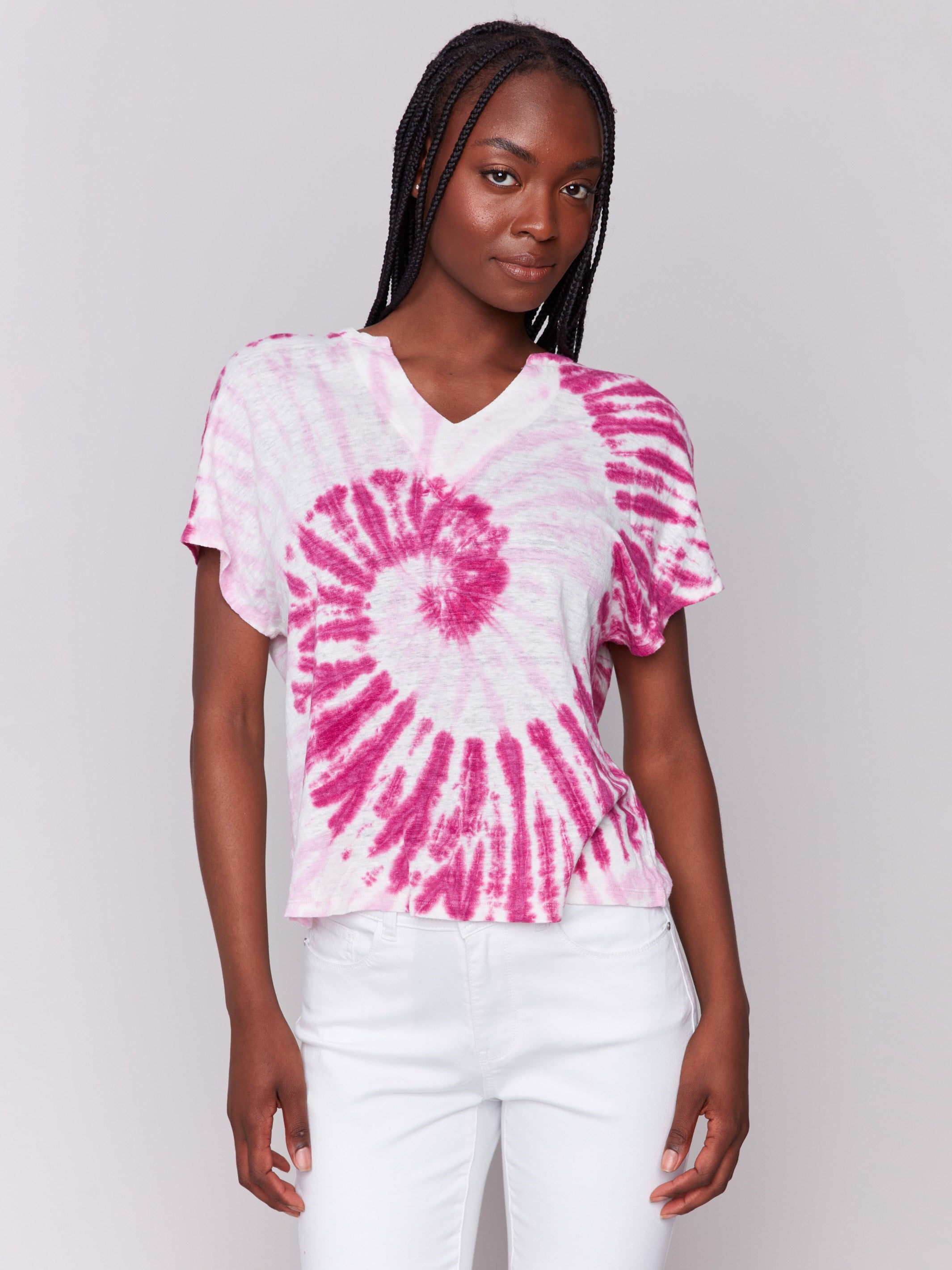 Pink tie-dye top with a stylish split neckline, perfect for casual wear by Charlie B.