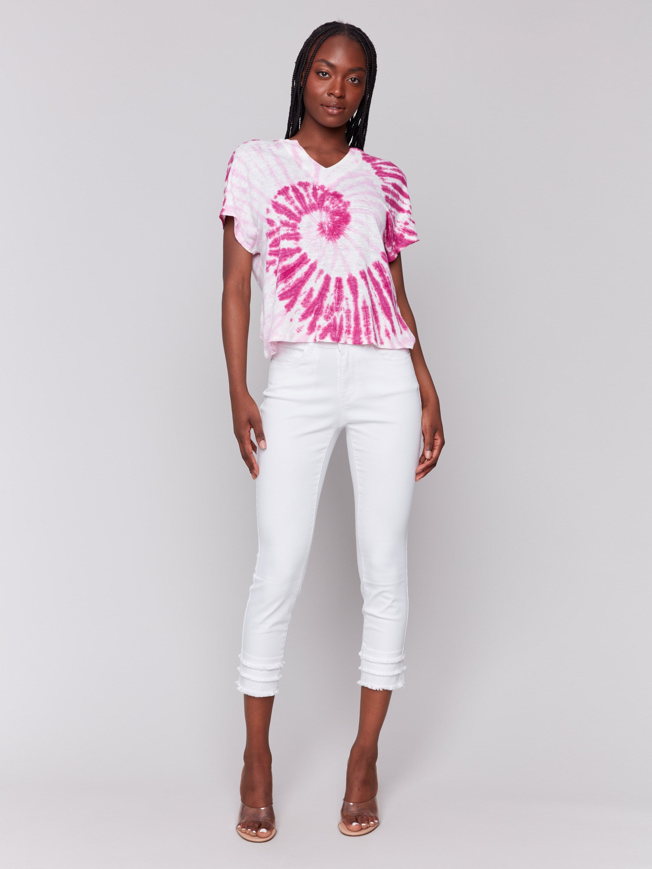 Dolman sleeves enhance the relaxed fit of this vibrant pink tie-dye shirt by Charlie B.