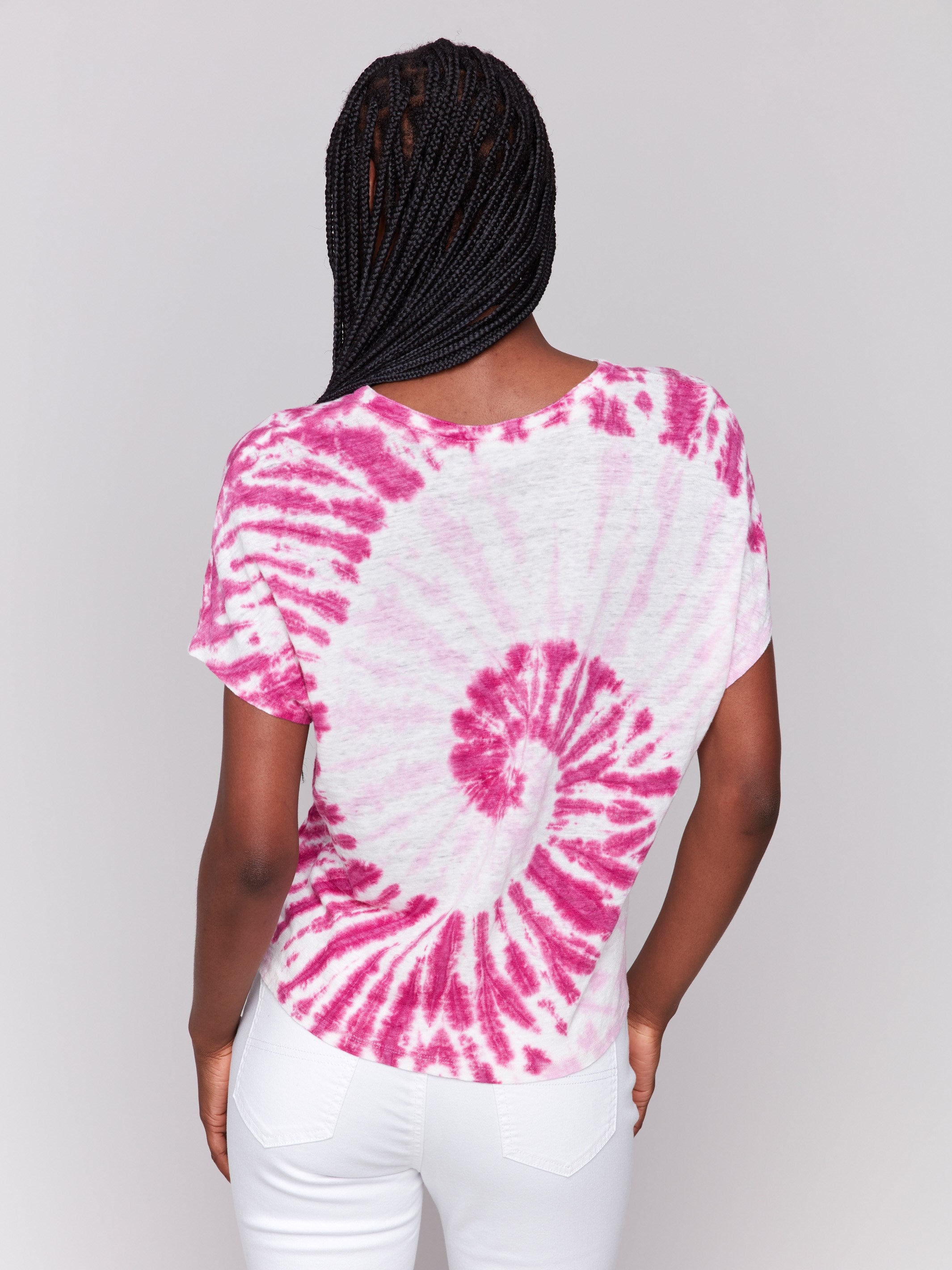 Relaxed fit and short sleeves make this pink top ideal for warm days by Charlie B.