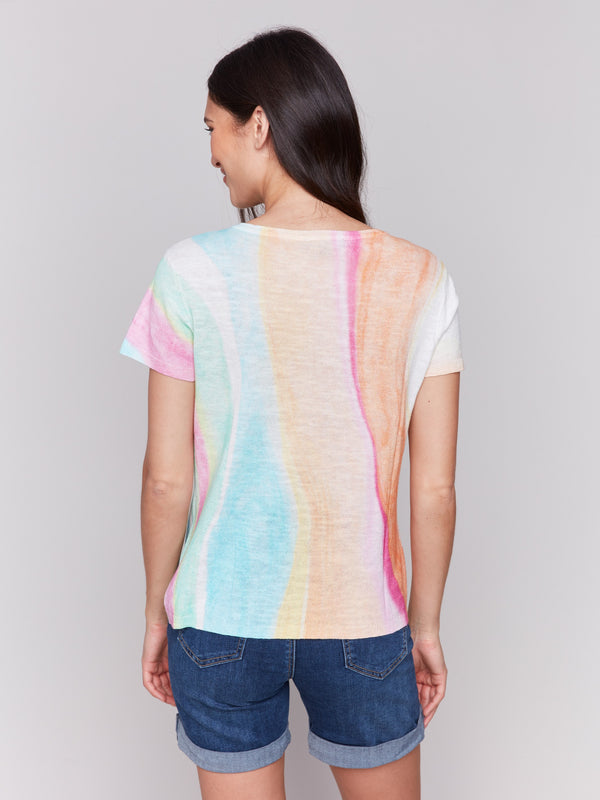 Vibrant rainbow-patterned sweater crafted from linen-cotton blend, offering both style and comfort by Charlie B.