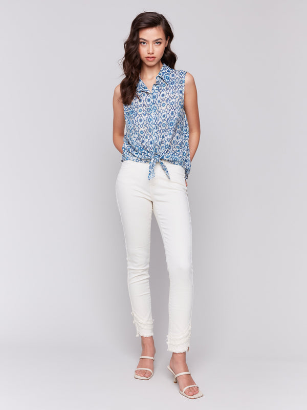 Printed sleeveless shirt featuring an adjustable front tie by Charlie B.
