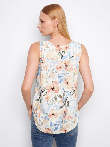 Stylish floral blouse featuring a rounded hem and airy sleeveless design, offering both comfort and elegance by Charlie B.