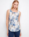 Floral top with a scoop neckline, showcasing a casual elegance. Perfect for warm days or layering in cooler weather by Charlie B.