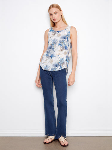 Chic sleeveless floral top paired with jeans, ideal for a relaxed yet stylish look. A versatile addition to any wardrobe by Charlie B.