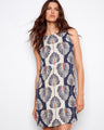 Dress featuring side button detail adds a unique touch to the overall look, enhancing its visual appeal. By Charlie B.