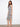 Stylish midi length dress with side slits, perfect for effortless movement and elegance. Fashioned by Charlie B.