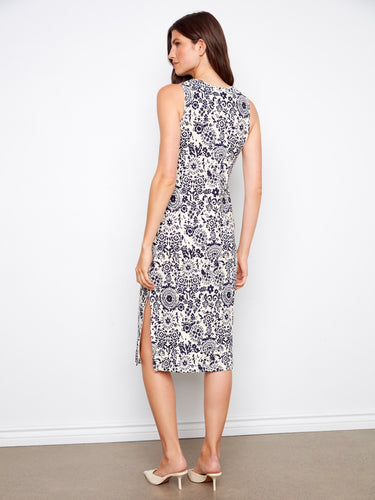 Beautifully patterned dress highlighting its unique design elements, adding charm to your collection. Created by Charlie B.