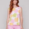 Top with a crew neckline and vibrant splatter print by Charlie B.