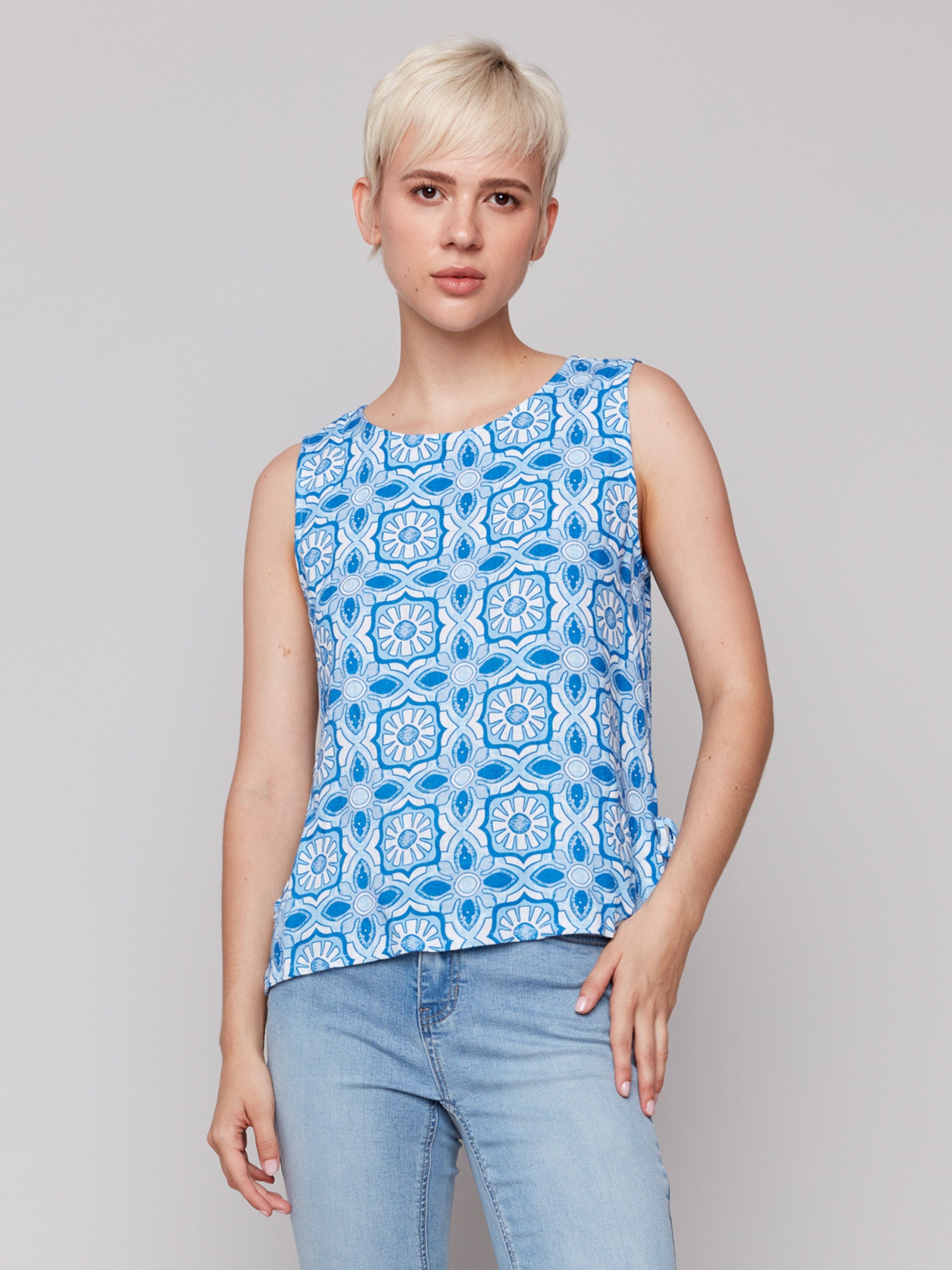 Top with a crew neckline and geometric print, offering a stylish look by Charlie B.