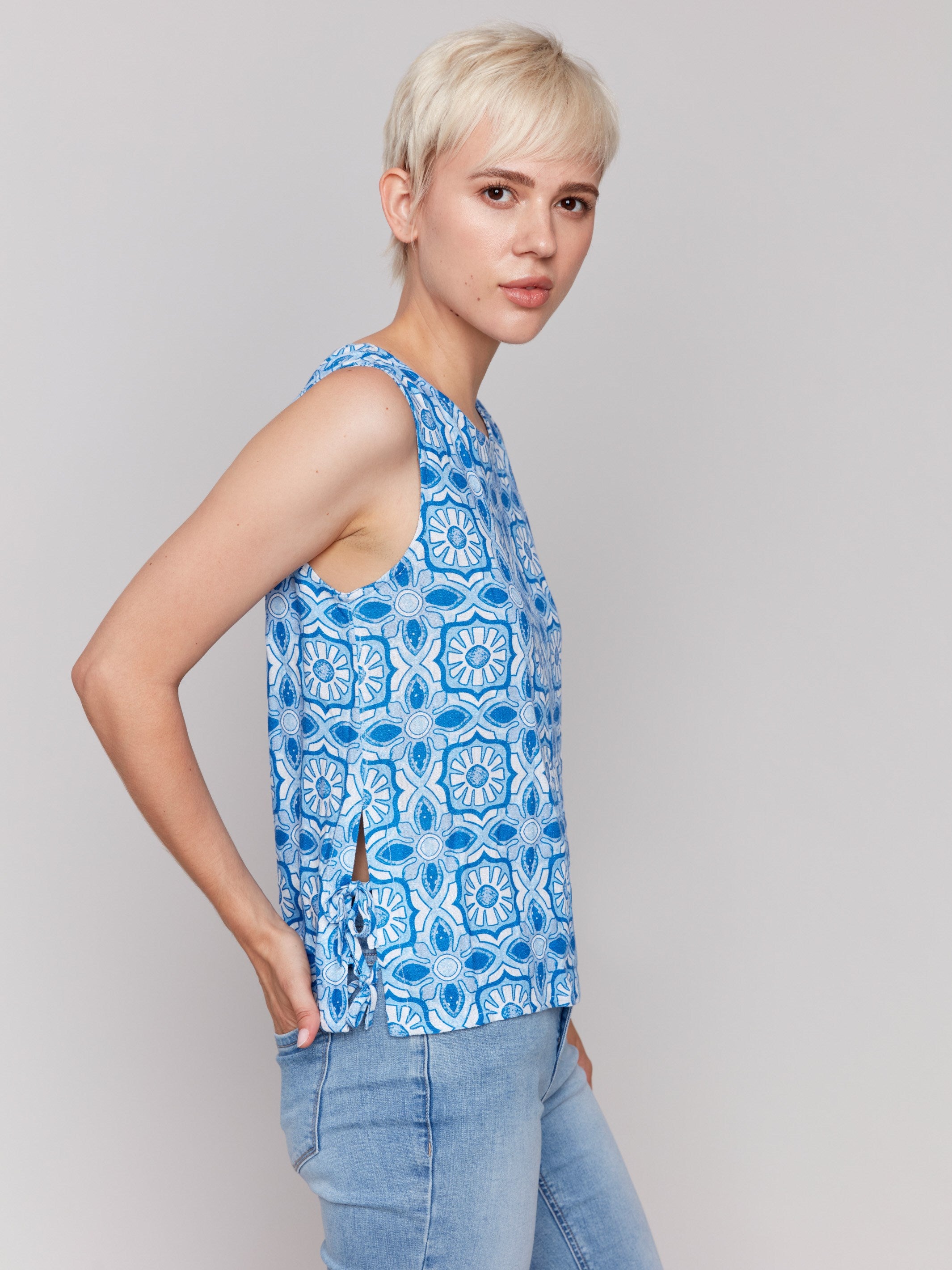 Geometric print top featuring side tie details, perfect for casual outings by Charlie B.