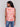 Coral sleeveless top with hem slit and abstract print by Charlie B.