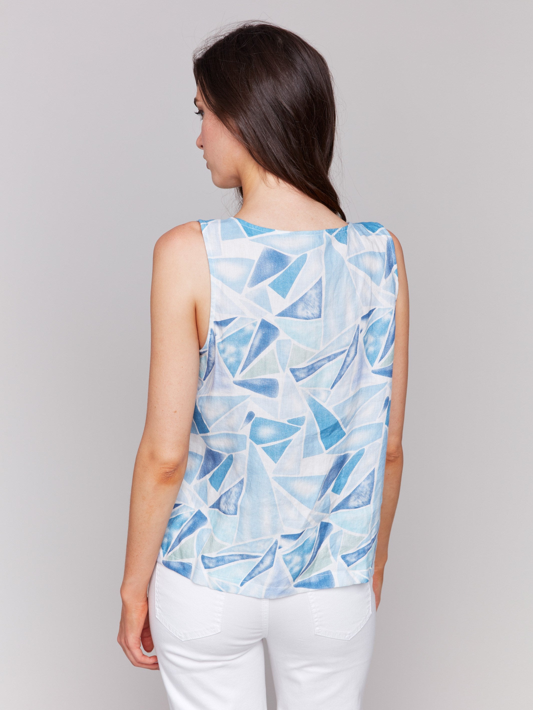 Sleeveless denim top featuring a slit at hem by Charlie B.