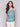 Lilypad sleeveless top featuring a crew neckline by Charlie B.