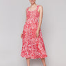 Red and white printed midi dress with shirring detail at bodice by Charlie B.
