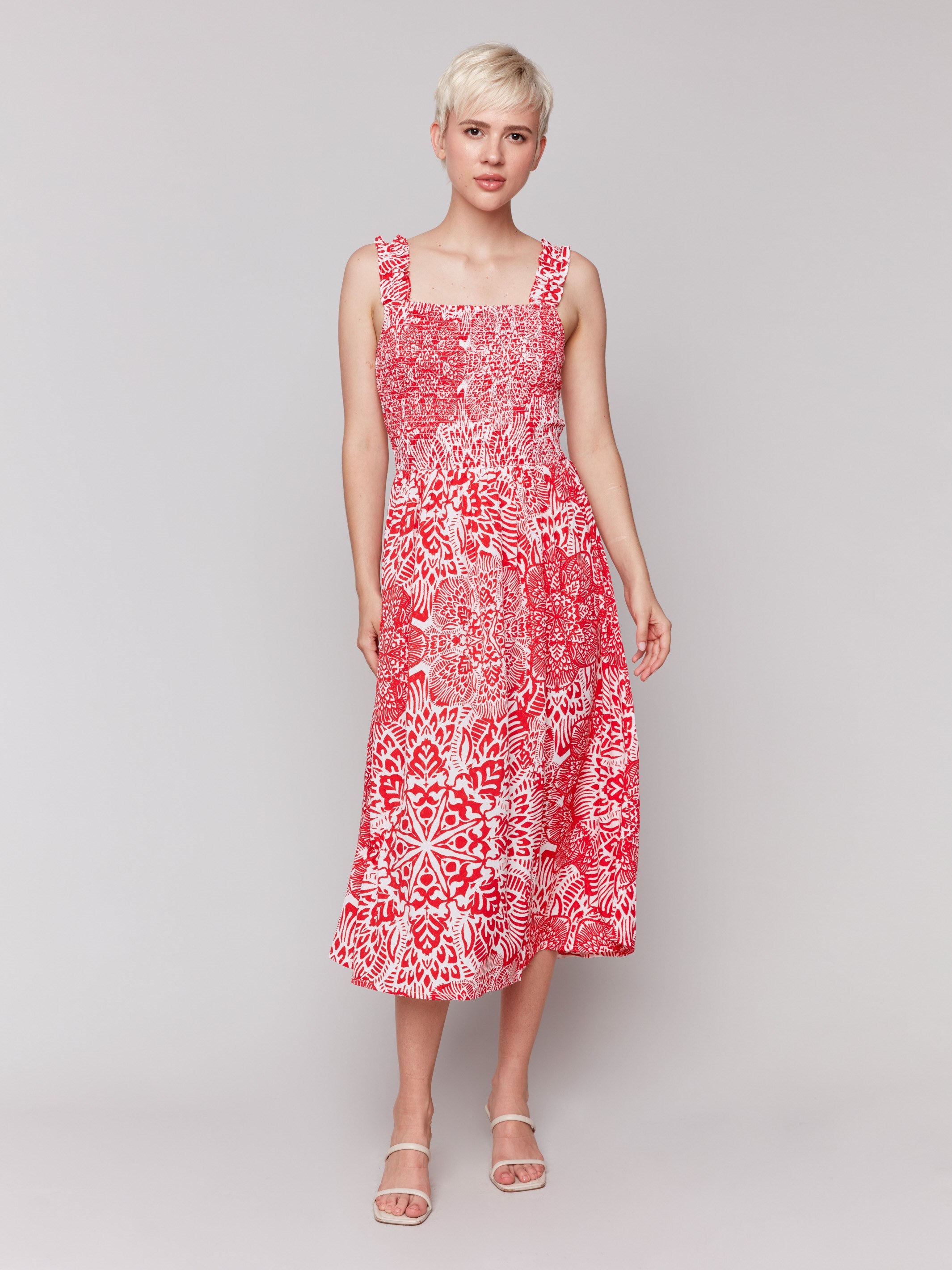 Midi dress in red and white with a stylish sleeveless design by Charlie B.