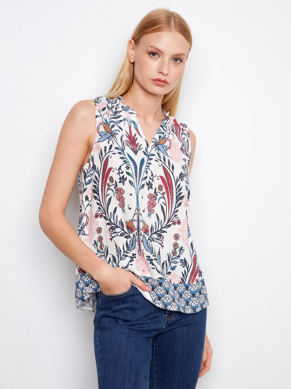 Wilderness-themed sleeveless top featuring an elegant ruffled neckline by Charlie B.