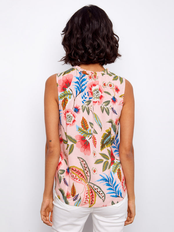 This sleeveless design offers a breezy feel, ideal for layering or wearing alone by Charlie B.