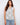 Top with a gardenia floral print and V-neck, crafted in lightweight fabric for a breezy feel by Charlie B.