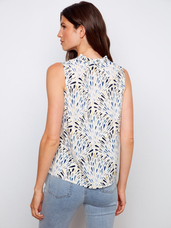 Stylish sleeveless top adorned with gardenia floral print in breathable fabric for comfort by Charlie B.