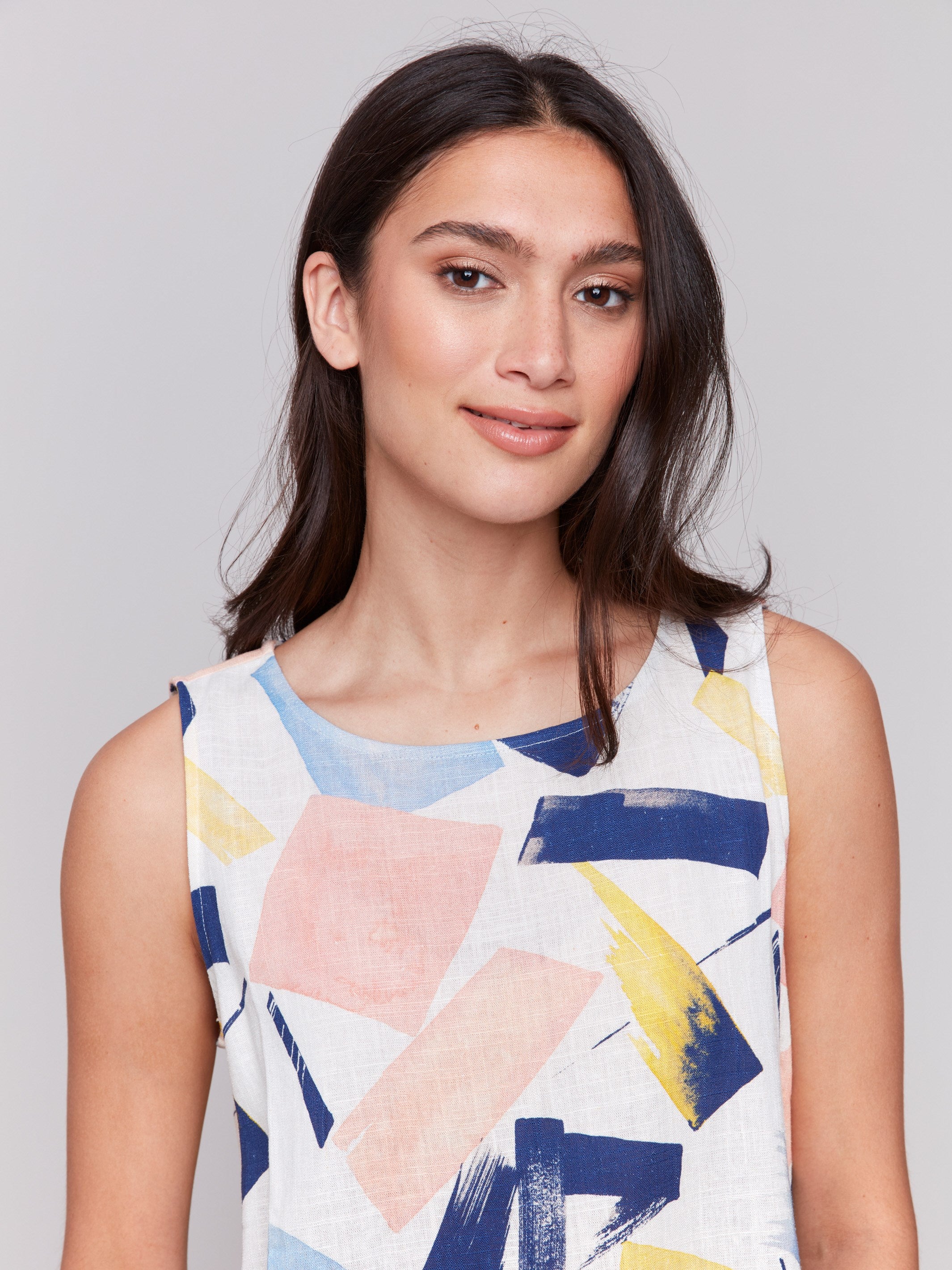 Stylish sleeveless design in abstract print by Charlie B.