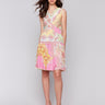 Knee length dress with vibrant abstract pattern by Charlie B.