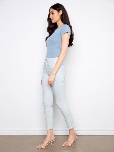 The slit at the hem adds a unique touch to these stylish jeans, enhancing their overall appeal. Exclusively by Charlie B.