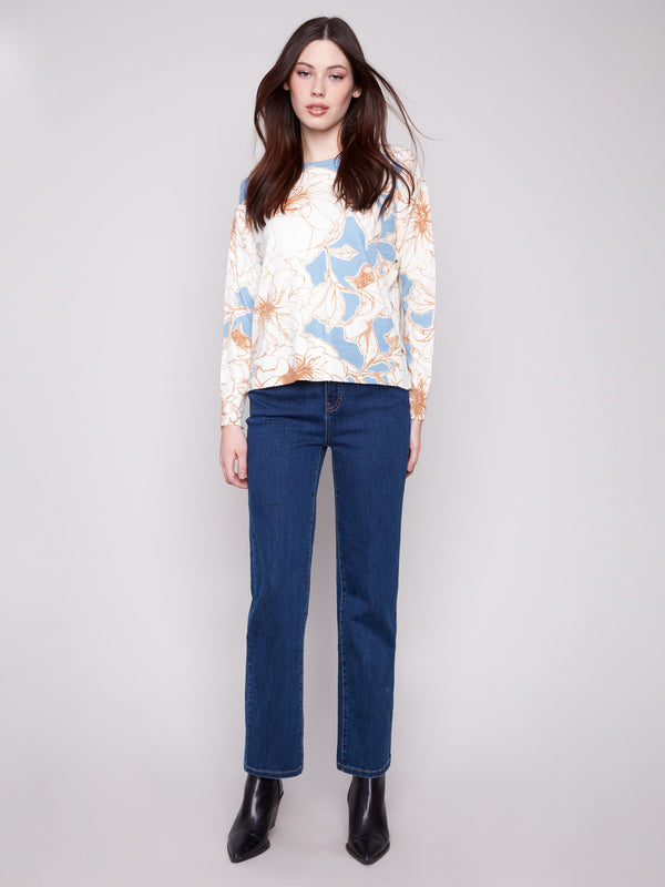 Floral mist print sweater with long sleeves for a cozy feel by Charlie B.