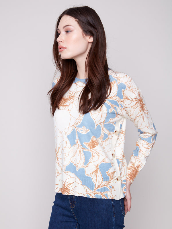 Chic sweater adorned with side buttons and floral mist print by Charlie B.