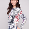 Sweater featuring a crew neck with an abstract Frame print and stylish side buttons by Charlie B.