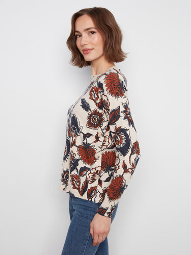Richly detailed floral print on a comfortable fabric makes this piece both eye-catching and versatile. By Charlie B.