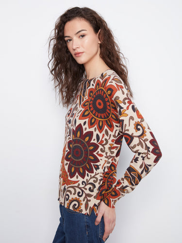 The side buttons on this sweater add an extra element of detail, enhancing its overall aesthetic appeal by Charlie B.