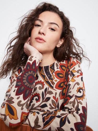 Exquisite drop shoulder detailing enhances the casual elegance of this beautifully designed floral print top by Charlie B.