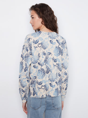 Beautifully crafted floral top that combines elegance and comfort effortlessly for everyday wear. By Charlie B.