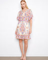 Dress with intricate abstract patterns and a flattering V-neck, enhanced by flutter sleeves for a chic look by Charlie B.