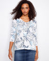Elegant V-neck top with a stunning placement print design, perfect for any occasion. Features 3/4 sleeves by Charlie B.