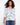 Elegant V-neck top with a stunning placement print design, perfect for any occasion. Features 3/4 sleeves by Charlie B.