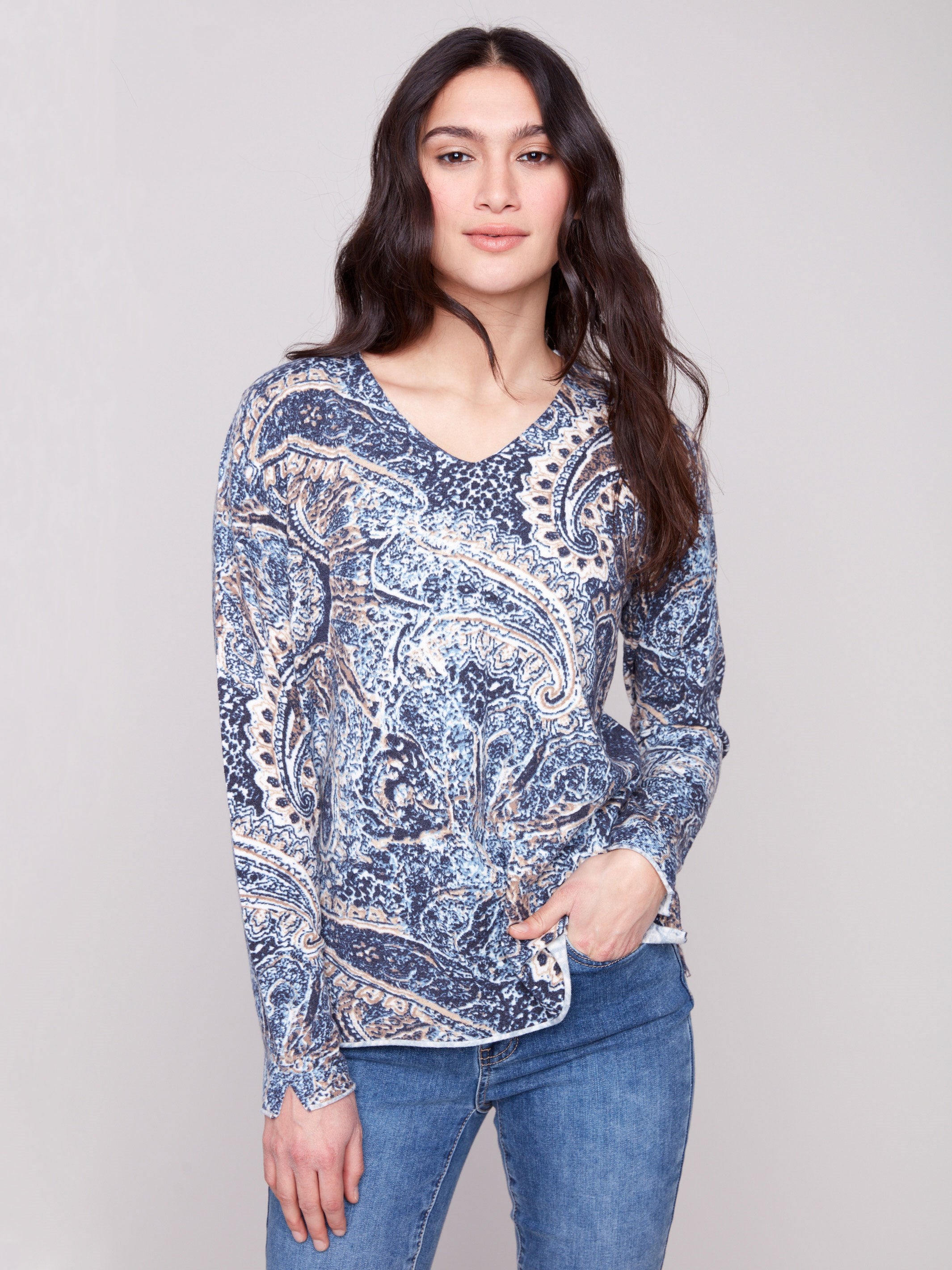 Sweater showcasing a plushy yarn texture and colorful paisley pattern, featuring long sleeves for added warmth by Charlie B.