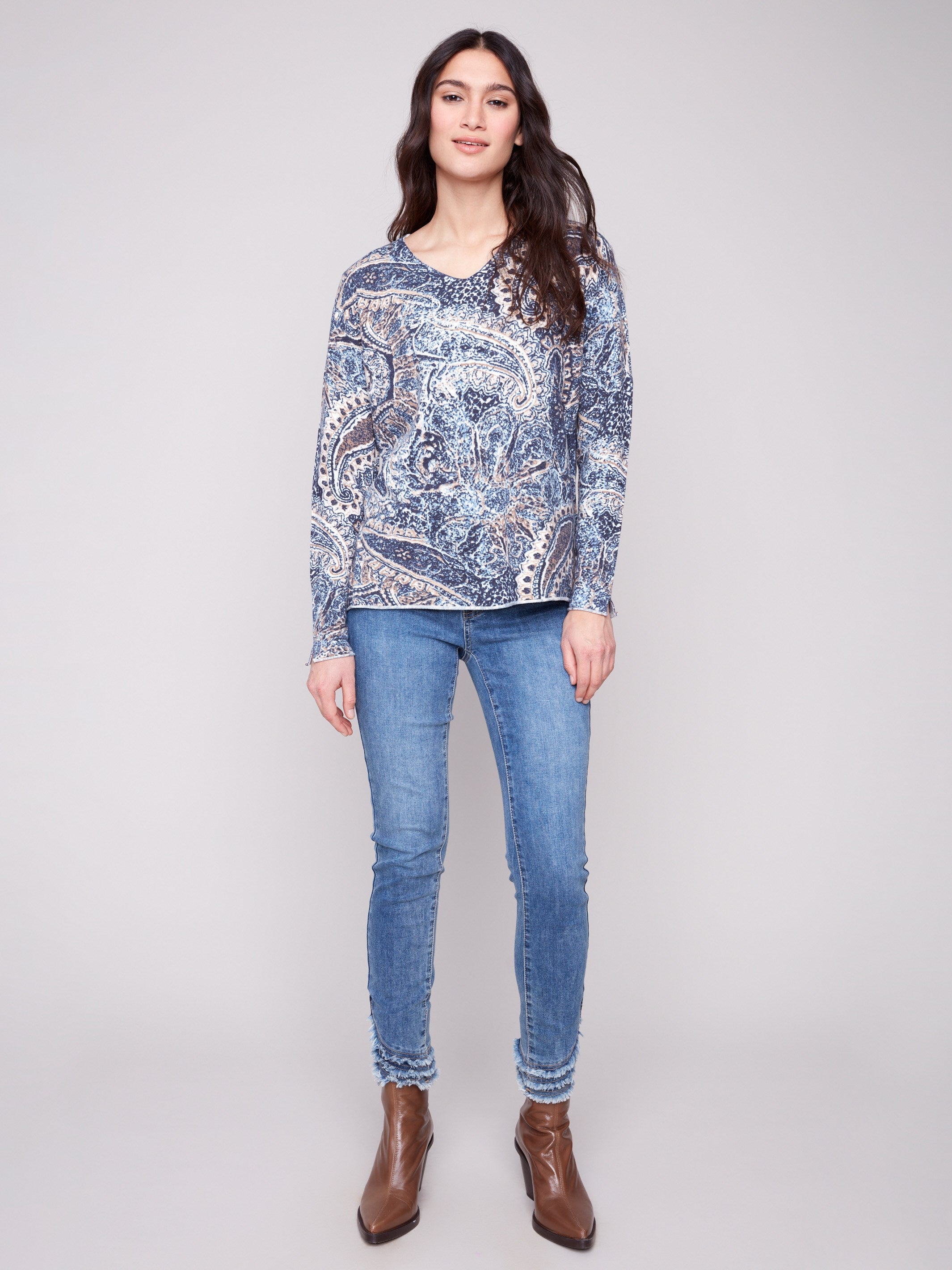 Sweater with a plushy yarn texture and vibrant paisley design, highlighting its relaxed fit for casual comfort by Charlie B.