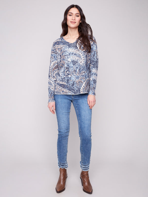 Sweater with a plushy yarn texture and vibrant paisley design, highlighting its relaxed fit for casual comfort by Charlie B.