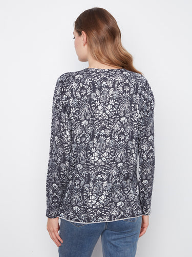 Effortlessly chic floral top in a relaxed fit with exquisite long sleeves perfect for every season. By Charlie B.