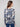 Sweater with a plushy yarn texture and colorful floral pattern, detailed with side slits at cuffs and hem by Charlie B.
