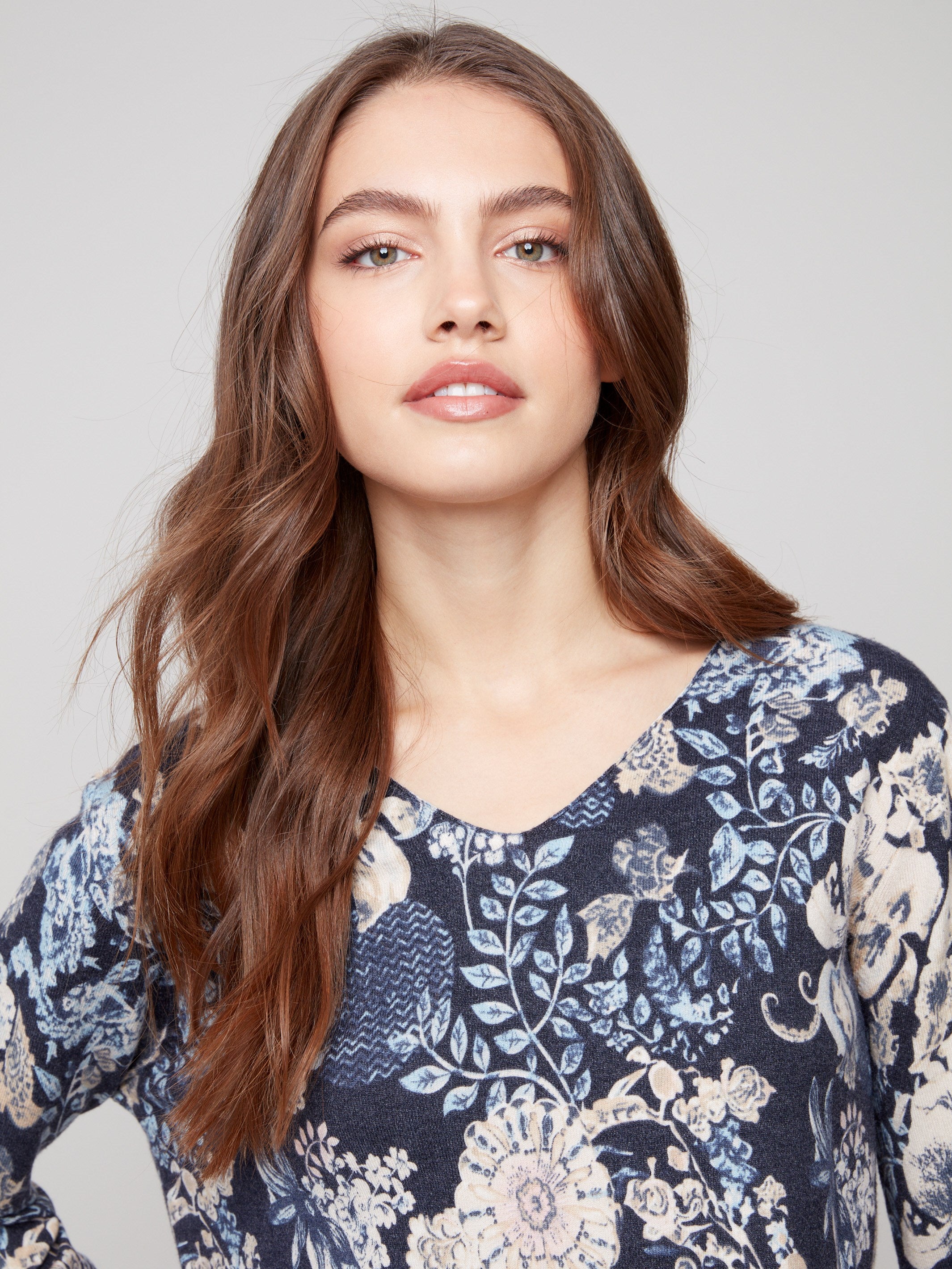 Sweater with a plushy yarn texture in vibrant florals, designed for style and comfort by Charlie B.