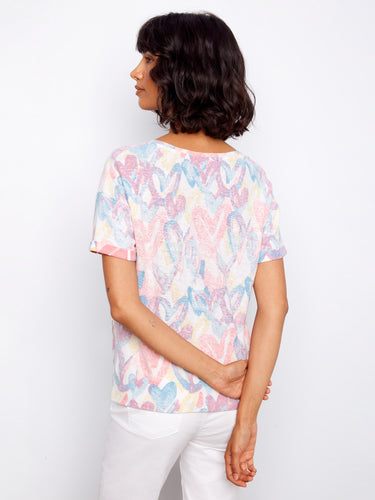 Elegant heart-patterned T-shirt with a charming side knot detail for added flair by Charlie B.