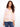 Chic top showcasing a V-neck design, perfect for casual outings. The subtle pattern adds elegance to any look by Charlie B.