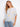 Striped dolman top featuring a boat neckline and sunny embroidery, crafted from lightweight fabric by Charlie B.