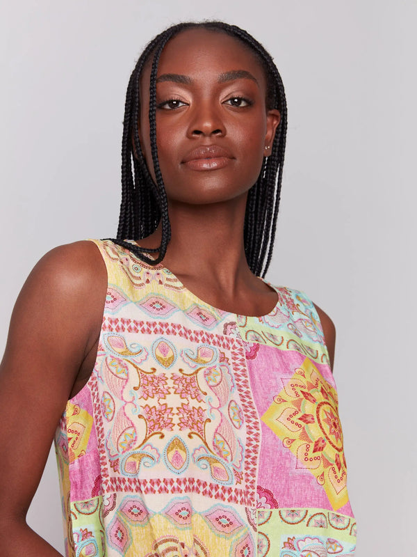 Sleeveless top with crew neckline and vibrant print by Charlie B.
