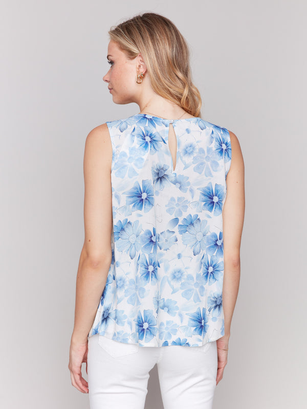 Top with keyhole back and button closure, adorned with celestial flora by Charlie B.